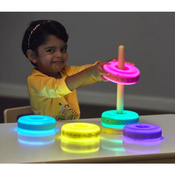 Glowing discs with wooden stand