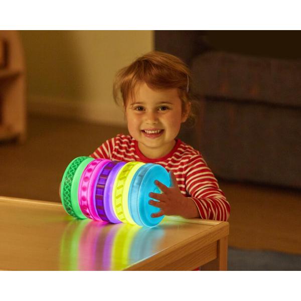 Glowing discs with wooden stand