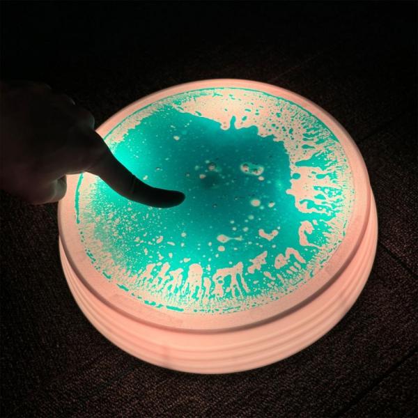Round sensory LED balance stones with liquid