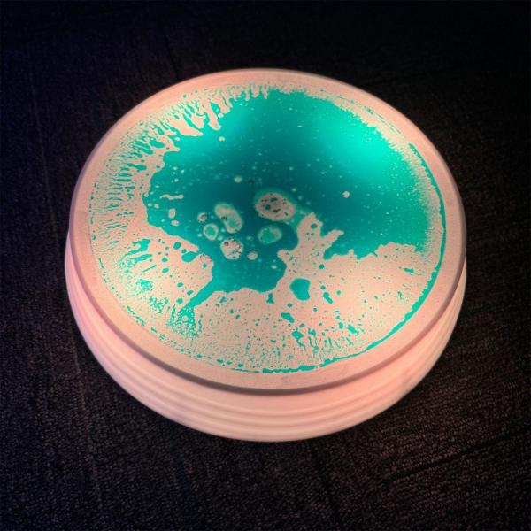 Round sensory LED balance stones with liquid