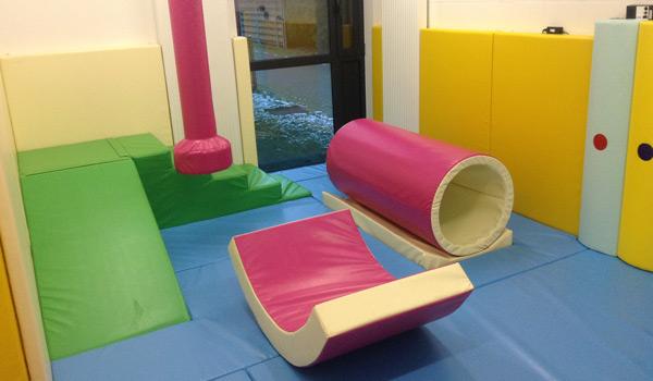 Softplay room with rainbow panels